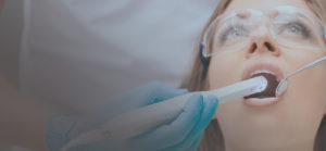 Patient being examined with the intraoral camera